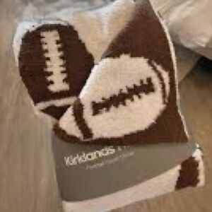 NWT Cloud soft football throw 50" x 60" Reversible colors. Unopened. Non smoking